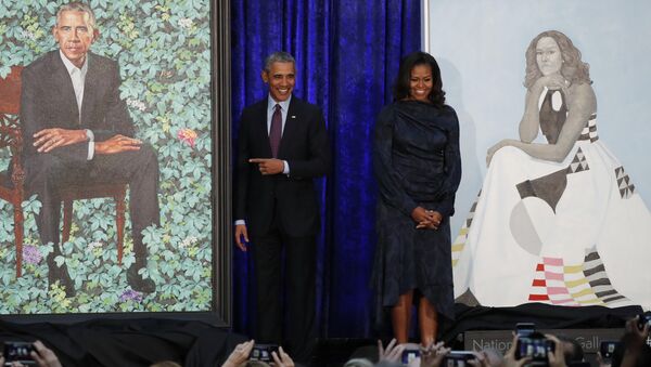 Former U.S. President Barack Obama and former first lady Michelle Obama stand with their portraits during an unveiling ceremony at the Smithsonian’s National Portrait Gallery in Washington, U.S., February 12, 2018. - Sputnik International