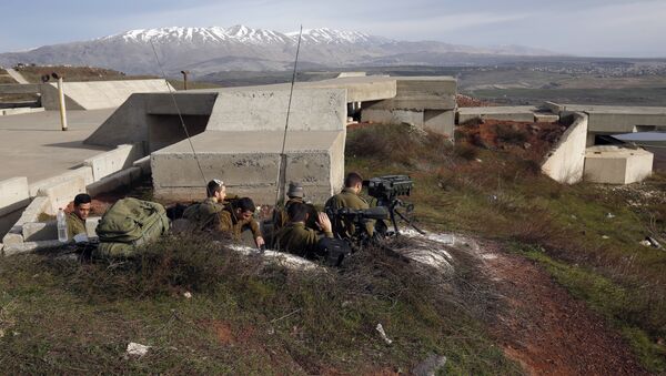A picture taken on February 10, 2018 show Israeli solders taking positions in the Israeli-occupied Golan Heights near the border with Syria - Sputnik International