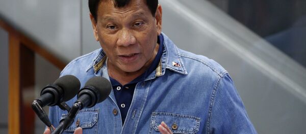 Philippine President Rodrigo Duterte addresses Filipino Overseas Workers who were repatriated from Kuwait, Tuesday, Feb. 13, 2018 at the Ninoy Aquino International Airport in suburban Pasay city southeast of Manila, Philippines - Sputnik International
