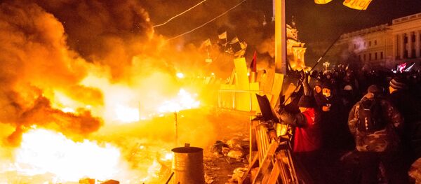 Opposition supporters on Maidan Square in Kiev where clashes between protesters and police began. (File) Opposition supporters on Maidan Square in Kiev where clashes between protesters and police began. (File) - Sputnik International