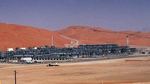 In this Monday, March 8, 2004 file photo, an industrial plant strips natural gas from freshly pumped crude oil is seen at Saudi Aramco's Shaybah oil field at Shaybah in Saudi Arabia's Rub al-Khali desert - Sputnik International
