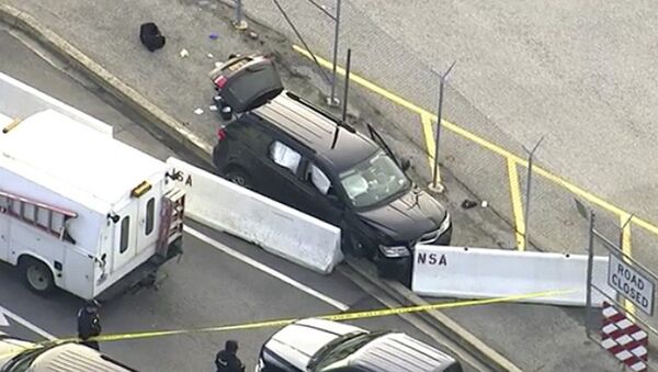 In this image made from video and provided by WUSA TV-9, authorities investigate the scene of a shooting at Fort Meade, Md. on Wednesday, Feb. 14, 2018 - Sputnik International
