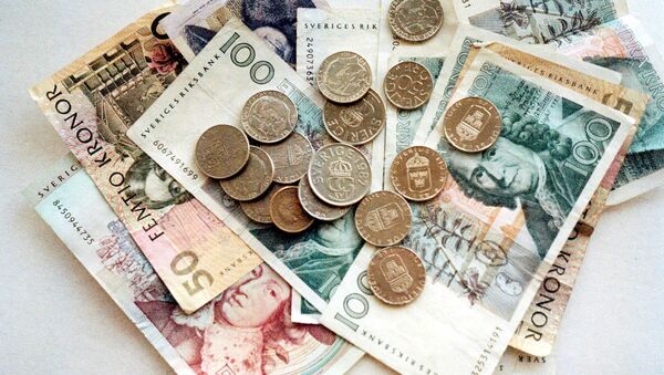 Different Swedish bank notes and coins. (File) - Sputnik International