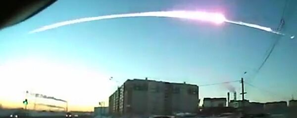 The trace of a flying object in the sky over Chelyabinsk (still from a dashboard camera). (File) - Sputnik International