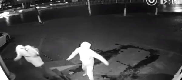 Burglar in Shanghai throws brick at partner instead of window Burglar in Shanghai throws brick at partner instead of window - Sputnik International