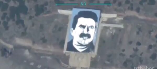 Turkish UAV destroys PKK leader portrait in Afrin Turkish UAV destroys PKK leader portrait in Afrin - Sputnik International