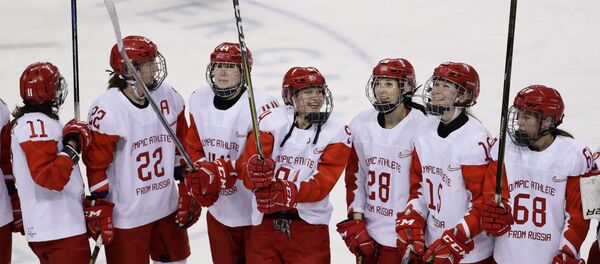 Ice Hockey - Pyeongchang 2018 Winter Olympics - Women's Quarterfinal Match - Olympic Athletes from Russia v SWI - Kwandong Hockey Centre, Gangneung, South Korea - February 17, 2018 - Olympic Athletes from Russia celebrate after defeating Switzerland Ice Hockey - Pyeongchang 2018 Winter Olympics - Women's Quarterfinal Match - Olympic Athletes from Russia v SWI - Kwandong Hockey Centre, Gangneung, South Korea - February 17, 2018 - Olympic Athletes from Russia celebrate after defeating Switzerland - Sputnik International