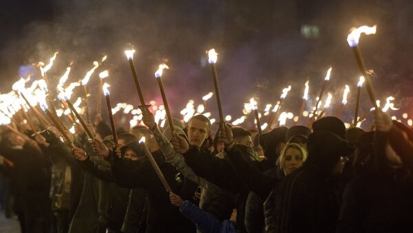 Members of nationalist organizations march with torches during a march to commemorate Bulgarian General and politician Hristo Lukov, in the centre of Sofia on February 17, 2018 - Sputnik International