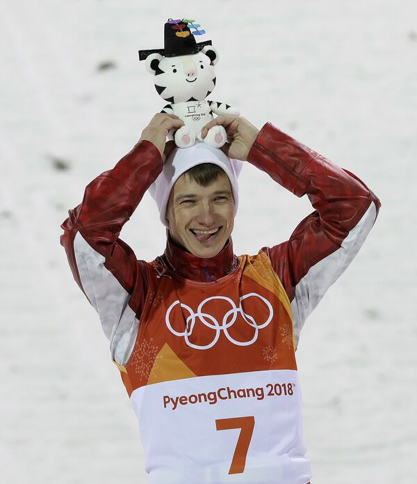 Bronze medal winner Russian athlete Ilia Burov celebrates after the men's aerial final at Phoenix Snow Park at the 2018 Winter Olympics in Pyeongchang, South Korea, Sunday, Feb. 18, 2018 - Sputnik International