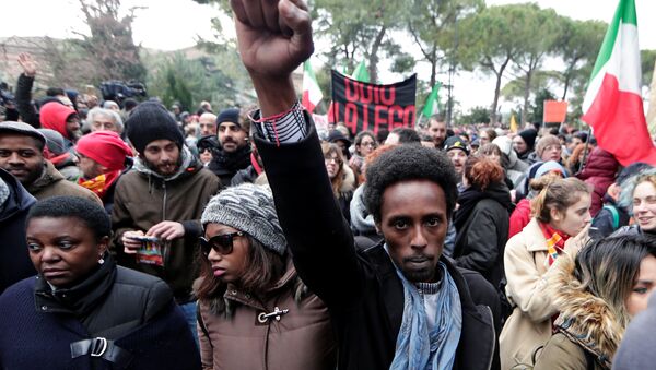 Demonstrators march during an anti-racism rally in Macerata, Italy, February 10, 2018 - Sputnik International