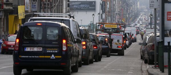 Stranded vehicles stand on a blocked street in Brussels as public transports are on strike following a call of several unions (CGSP-ACOD and CGSLB-ACLVB) - Sputnik International