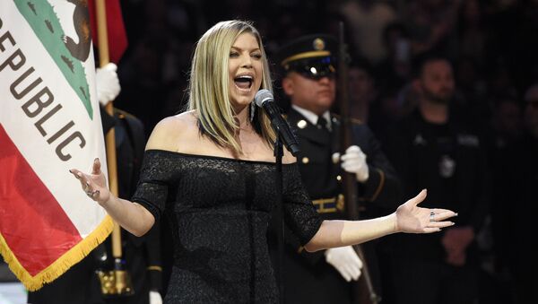 Singer Fergie performs the national anthem prior to an NBA All-Star basketball game, Sunday, Feb. 18, 2018, in Los Angeles - Sputnik International