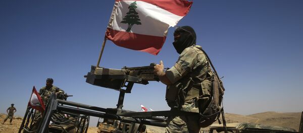 Lebanese soldiers sit on top of an armored personnel carrier (File) Lebanese soldiers sit on top of an armored personnel carrier (File) - Sputnik International