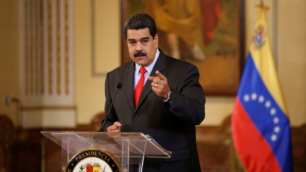 Venezuela's President Nicolas Maduro gestures as he talks to the media during a news conference in Caracas, Venezuela February 15, 2018 - Sputnik International