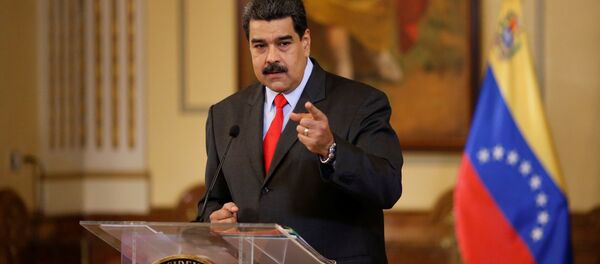 Venezuela's President Nicolas Maduro gestures as he talks to the media during a news conference in Caracas, Venezuela February 15, 2018 Venezuela's President Nicolas Maduro gestures as he talks to the media during a news conference in Caracas, Venezuela February 15, 2018 - Sputnik International