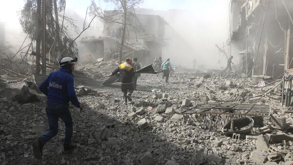 Members of the Syrian Civil Defense run to help survivors from a street that attacked by airstrikes and shelling of the Syrian government forces, in Ghouta, suburb of Damascus, Syria - Sputnik International