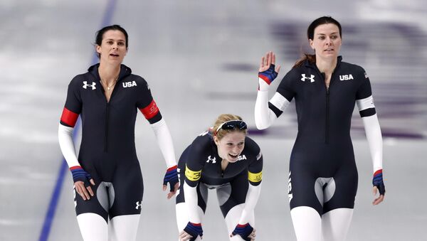 Speed Skating - Pyeongchang 2018 Winter Olympics - Women's Team Pursuit Competition - Gangneung Oval - Gangneung, South Korea - February 19, 2018. Heather Bergsma, Brittany Bowe and Mia Manganello of the U.S react - Sputnik International
