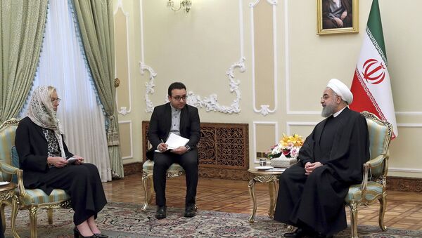 President Hassan Rouhani, right, speaks with the Netherlands' Foreign Minister Sigrid Kaag, left, at the presidency office, in Tehran, Iran - Sputnik International