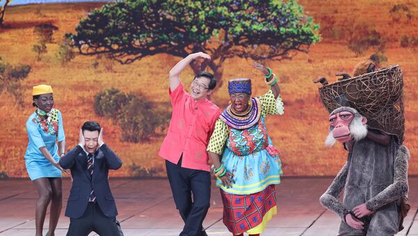 Chinese actor Lou Naiming (2-R) performs a skit on a Lunar New Year gala in Beijing, China - Sputnik International