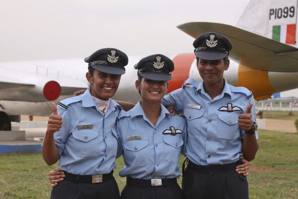 The first three women fighter pilots of the Indian Air Force, from left, Mohana Singh, Avani Chaturvedi and Bhawana Kanth pose for photographs after the graduation parade at the Indian Air Force academy in Dundigal, outskirts of Hyderabad, India, Saturday, June 18, 2016 The first three women fighter pilots of the Indian Air Force, from left, Mohana Singh, Avani Chaturvedi and Bhawana Kanth pose for photographs after the graduation parade at the Indian Air Force academy in Dundigal, outskirts of Hyderabad, India, Saturday, June 18, 2016 - Sputnik International
