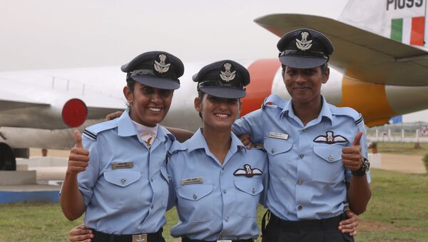 The first three women fighter pilots of the Indian Air Force, from left, Mohana Singh, Avani Chaturvedi and Bhawana Kanth pose for photographs after the graduation parade at the Indian Air Force academy in Dundigal, outskirts of Hyderabad, India, Saturday, June 18, 2016 - Sputnik International