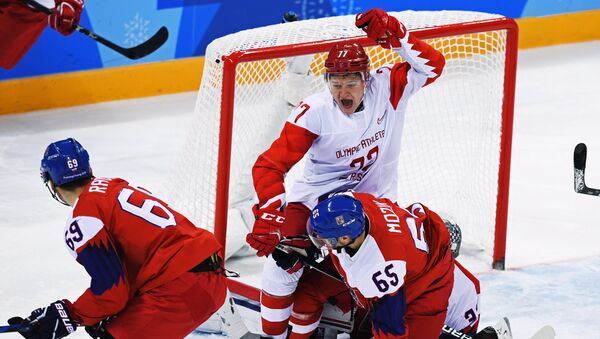 Vojtech Mozik (Czech Republic) and Kirill Kaprizov (Russia), right to left, during the semifinals between the Russia and Czech Republic national teams in the men’s ice hockey tournament, at the XXIII Olympic Winter Games - Sputnik International