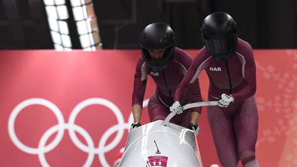Russia's Nadezhda Sergeeva (R) and Russia's Anastasia Kocherzhova compete in the women's bobsleigh heat 1 run during the Pyeongchang 2018 Winter Olympic Games, at the Olympic Sliding Centre on February 20, 2018 in Pyeongchang - Sputnik International