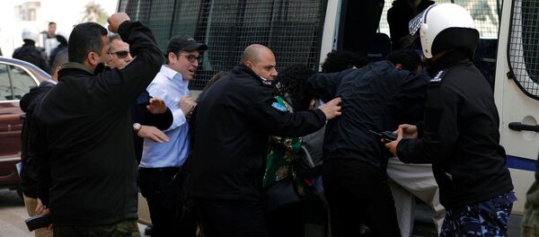 A U.S. delegation is evacuated by Palestinian police after they were attacked by Palestinian protesters in Ramallah, in the occupied West Bank February 22, 2018 A U.S. delegation is evacuated by Palestinian police after they were attacked by Palestinian protesters in Ramallah, in the occupied West Bank February 22, 2018 - Sputnik International