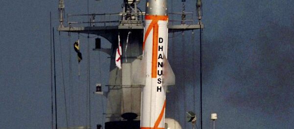 The home-developed Dhanush, or Bow missile, takes off from a navy warship in the Bay of Bengal off the coast of eastern Orissa state, India, Friday, March 11, 2011 The home-developed Dhanush, or Bow missile, takes off from a navy warship in the Bay of Bengal off the coast of eastern Orissa state, India, Friday, March 11, 2011 - Sputnik International