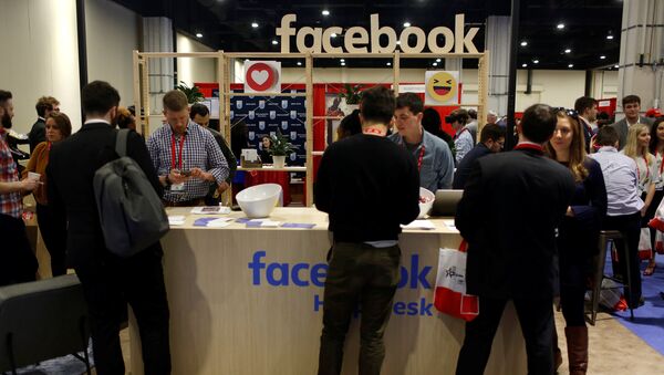 People stop at the Facebook booth at the Conservative Political Action Conference (CPAC) at National Harbor, Maryland, U.S., February 23, 2018 - Sputnik International
