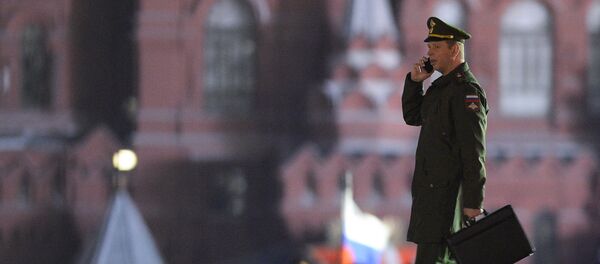 A serviceman with cell phone A serviceman with cell phone - Sputnik International