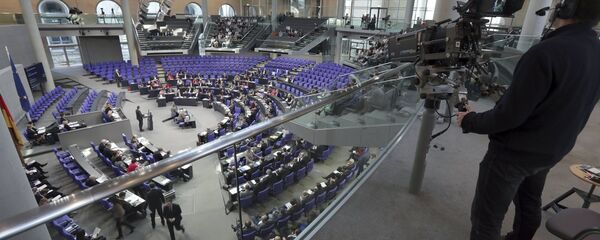 In this Friday, Feb. 2, 2018 photo a cameraman films a meeting of the German Federal Parliament, Bundestag, at the Reichstag building in Berlin, Germany. In this Friday, Feb. 2, 2018 photo a cameraman films a meeting of the German Federal Parliament, Bundestag, at the Reichstag building in Berlin, Germany. - Sputnik International