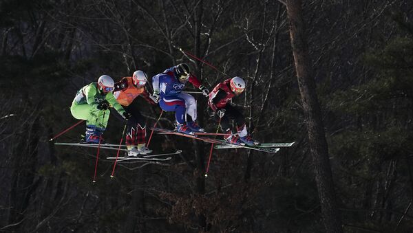 David Duncan of Canada (2nd from left) run the men's ski cross small final course during the 2018 Winter Olympics in Pyeongchang, South Korea, Wednesday, Feb. 21, 2018. - Sputnik International