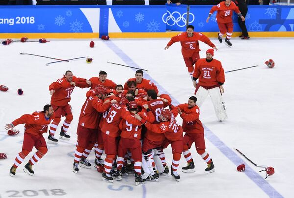 Russian ice hockey players celebrating their victory in the final match between Russia and Germany in the men's ice hockey tournament at the 2018 Winter Olympics Russian ice hockey players celebrating their victory in the final match between Russia and Germany in the men's ice hockey tournament at the 2018 Winter Olympics - Sputnik International