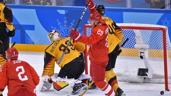 From left: Frank Hordler (Germany), Ilya Kablukov (Russia) and Danny aus den Birken (Germany) during the final match between Russia and Germany in the men's ice hockey tournament at the 2018 Winter Olympics. - Sputnik International