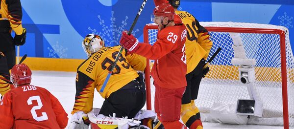 From left: Frank Hordler (Germany), Ilya Kablukov (Russia) and Danny aus den Birken (Germany) during the final match between Russia and Germany in the men's ice hockey tournament at the 2018 Winter Olympics. From left: Frank Hordler (Germany), Ilya Kablukov (Russia) and Danny aus den Birken (Germany) during the final match between Russia and Germany in the men's ice hockey tournament at the 2018 Winter Olympics. - Sputnik International