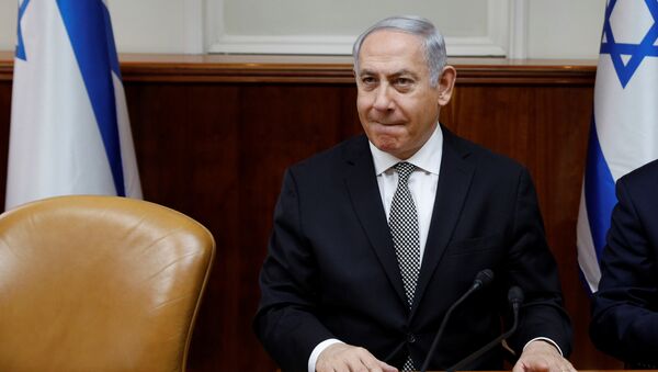 Israeli Prime Minister Benjamin Netanyahu attends the weekly cabinet meeting at the Prime Minister's office in Jerusalem February 25, 2018 - Sputnik International