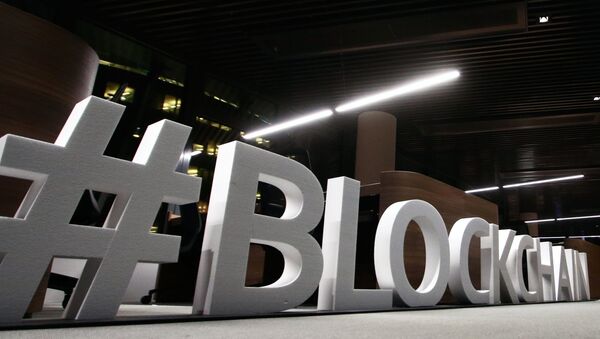 Giant letters, reading the word blockchain are displayed at the blockchain centre, which aims at boosting start-ups, on February 7, 2018 in Lithuania's capital Vilnius - Sputnik International