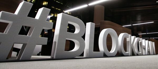 Giant letters, reading the word blockchain are displayed at the blockchain centre, which aims at boosting start-ups, on February 7, 2018 in Lithuania's capital Vilnius Giant letters, reading the word blockchain are displayed at the blockchain centre, which aims at boosting start-ups, on February 7, 2018 in Lithuania's capital Vilnius - Sputnik International