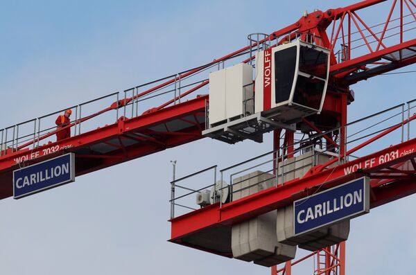 A worker walks along a crane on Carillion's Midland Metropolitan Hospital construction site in Smethwick, Britain January 29, 2018 A worker walks along a crane on Carillion's Midland Metropolitan Hospital construction site in Smethwick, Britain January 29, 2018 - Sputnik International