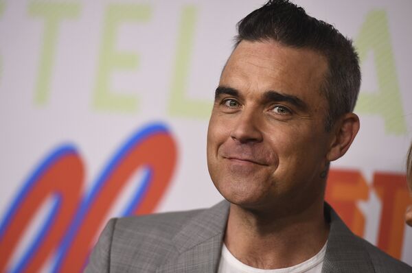 Robbie Williams Has Been Abducted by Aliens, British 'UFO Victim' Claims - Sputnik International