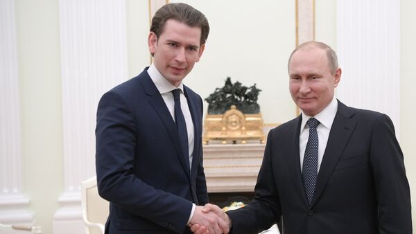 Russian President Vladimir Putin and Chancellor of Austria Sebastian Kurz, left, during a meeting - Sputnik International