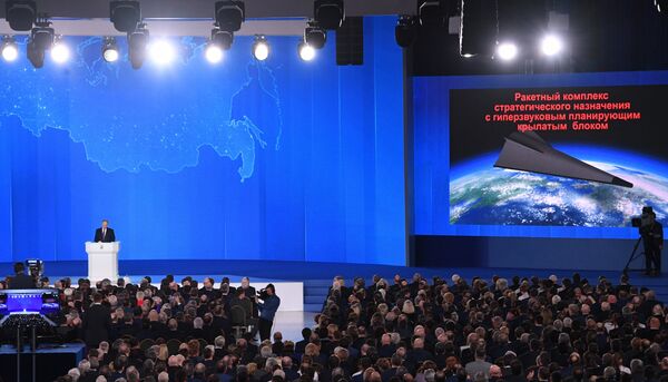 Russian President Vladimir Putin delivers his annual Presidential Address to the Federal Assembly at the Manezh Central Exhibition Hall Russian President Vladimir Putin delivers his annual Presidential Address to the Federal Assembly at the Manezh Central Exhibition Hall - Sputnik International