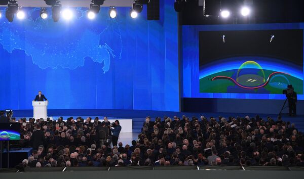  Russian President Vladimir Putin delivers his annual Presidential Address to the Federal Assembly at the Manezh Central Exhibition Hall - Sputnik International