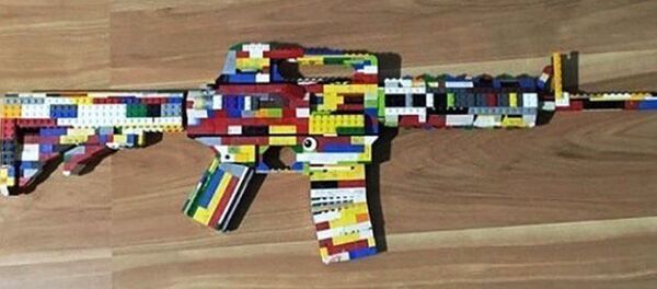 This undated photo provided by the San Diego County Sheriff's Office shows an AR-15 rifle made of Legos that Authorities say a 14-year-old boy posted on Instagram, along with a threat against West Hills High School in Santee, Calif This undated photo provided by the San Diego County Sheriff's Office shows an AR-15 rifle made of Legos that Authorities say a 14-year-old boy posted on Instagram, along with a threat against West Hills High School in Santee, Calif - Sputnik International