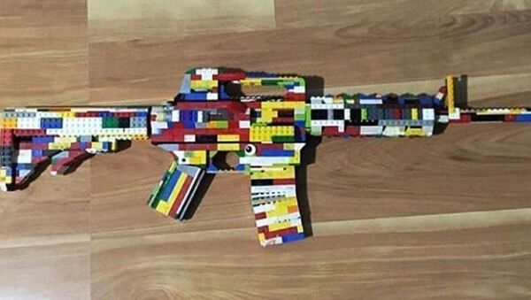 This undated photo provided by the San Diego County Sheriff's Office shows an AR-15 rifle made of Legos that Authorities say a 14-year-old boy posted on Instagram, along with a threat against West Hills High School in Santee, Calif - Sputnik International