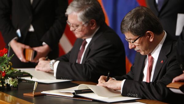 (File) Armenia's Foreign Minister Edouard Nalbandian, left, and Turkey's Foreign Minister Ahmet Davutoglu sign documents during the signing ceremony of a peace accord between Turkey and Armenia in Zurich, Switzerland Saturday Oct. 10, 2009 - Sputnik International