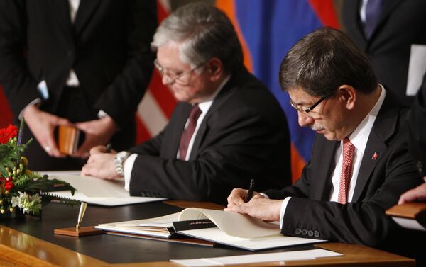 (File) Armenia's Foreign Minister Edouard Nalbandian, left, and Turkey's Foreign Minister Ahmet Davutoglu sign documents during the signing ceremony of a peace accord between Turkey and Armenia in Zurich, Switzerland Saturday Oct. 10, 2009 - Sputnik International