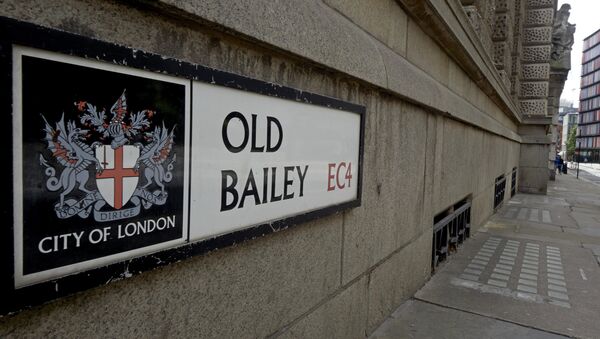 The coat of arms of the City of London (L) is pictured on the street sign for Old Bailey, where the Central Criminal Court, commonly referred to as The Old Bailey is situated in central London. (File) - Sputnik International