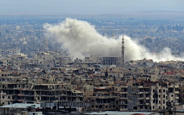A general view taken from a government-held area in Damascus shows smoke rising from the rebel-held enclave of Eastern Ghouta on the outskirts of the Syrian capital following fresh air strikes and rocket fire on February 27, 2018 A general view taken from a government-held area in Damascus shows smoke rising from the rebel-held enclave of Eastern Ghouta on the outskirts of the Syrian capital following fresh air strikes and rocket fire on February 27, 2018 - Sputnik International